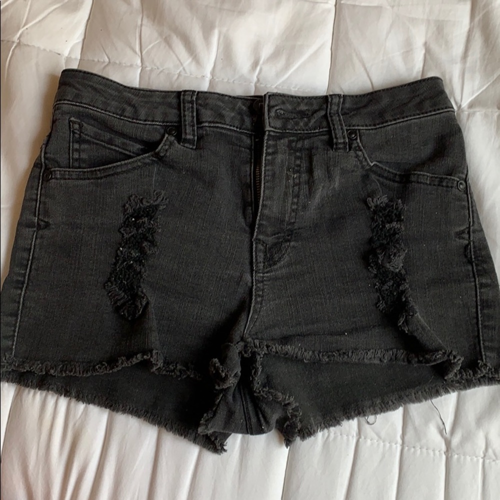 Volvo’s black distressed jean shorts